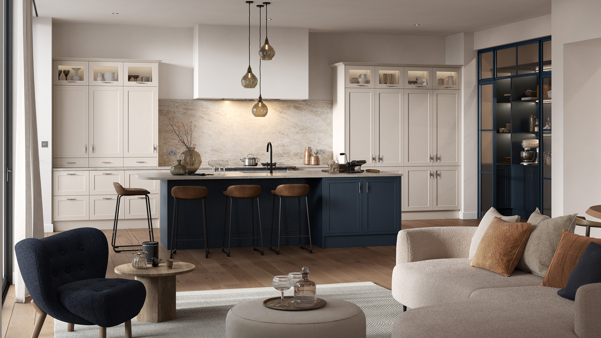 The Arrington kitchen in shell and slate blue, with a navy island, marble splashback and pendant lighting